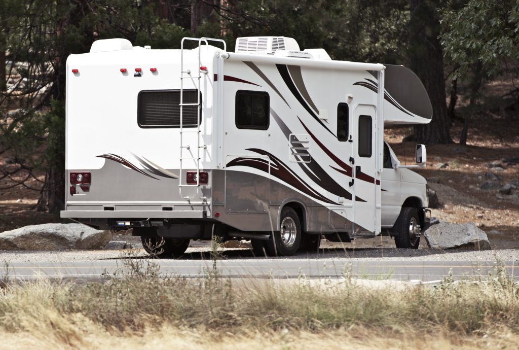 Class C Motorhome ( Rear ) - Campsite. Class C Recreational Vehicle. 