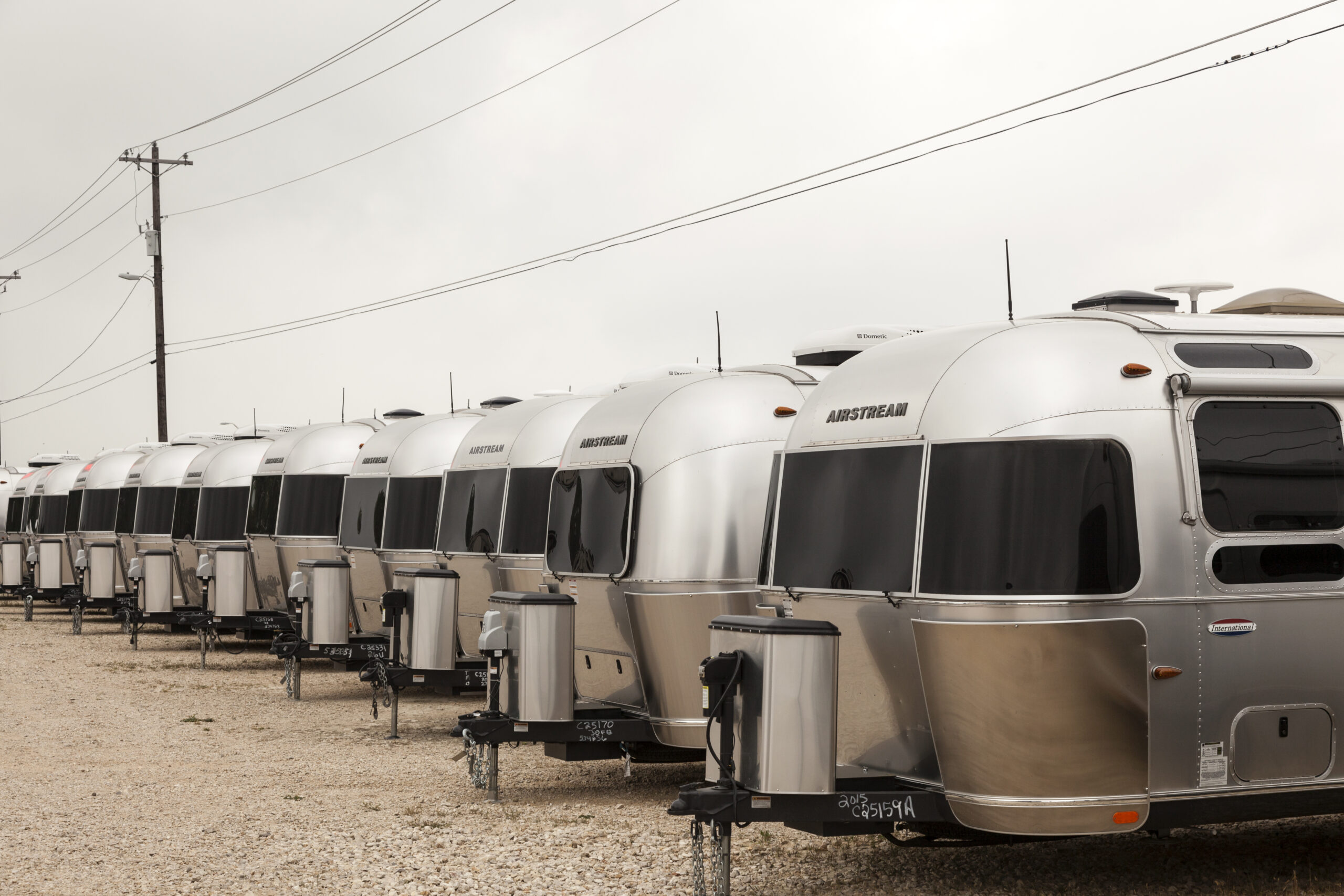 AUSTIN, USA - APR 11: Row of new luxury american Airstream trailers at a dealership in Texas. April 11, 2016 in Austin, Texas, United States